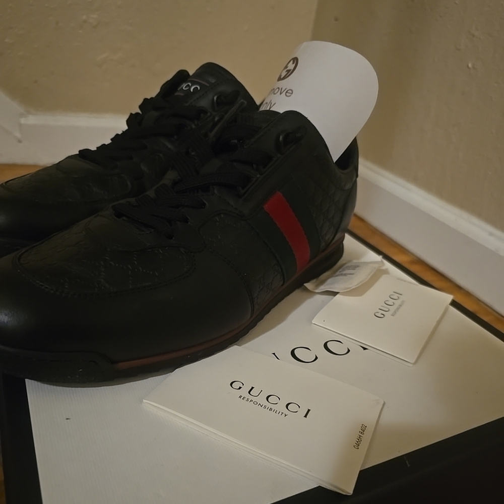 Gucci Men's Black Sneakers with Red Stripe. Very good condition. You can see the